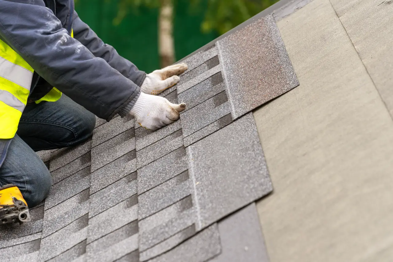 A Falcon Roofing installer paying attention to detail